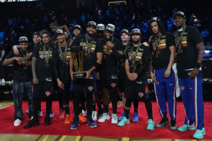 Dec 16, 2025; Las Vegas, Nevada, USA; The New York Knicks pose for a photograph after winning the Emirates NBA Cup Final at T-Mobile Arena. Mandatory Credit: Kirby Lee-Imagn Images