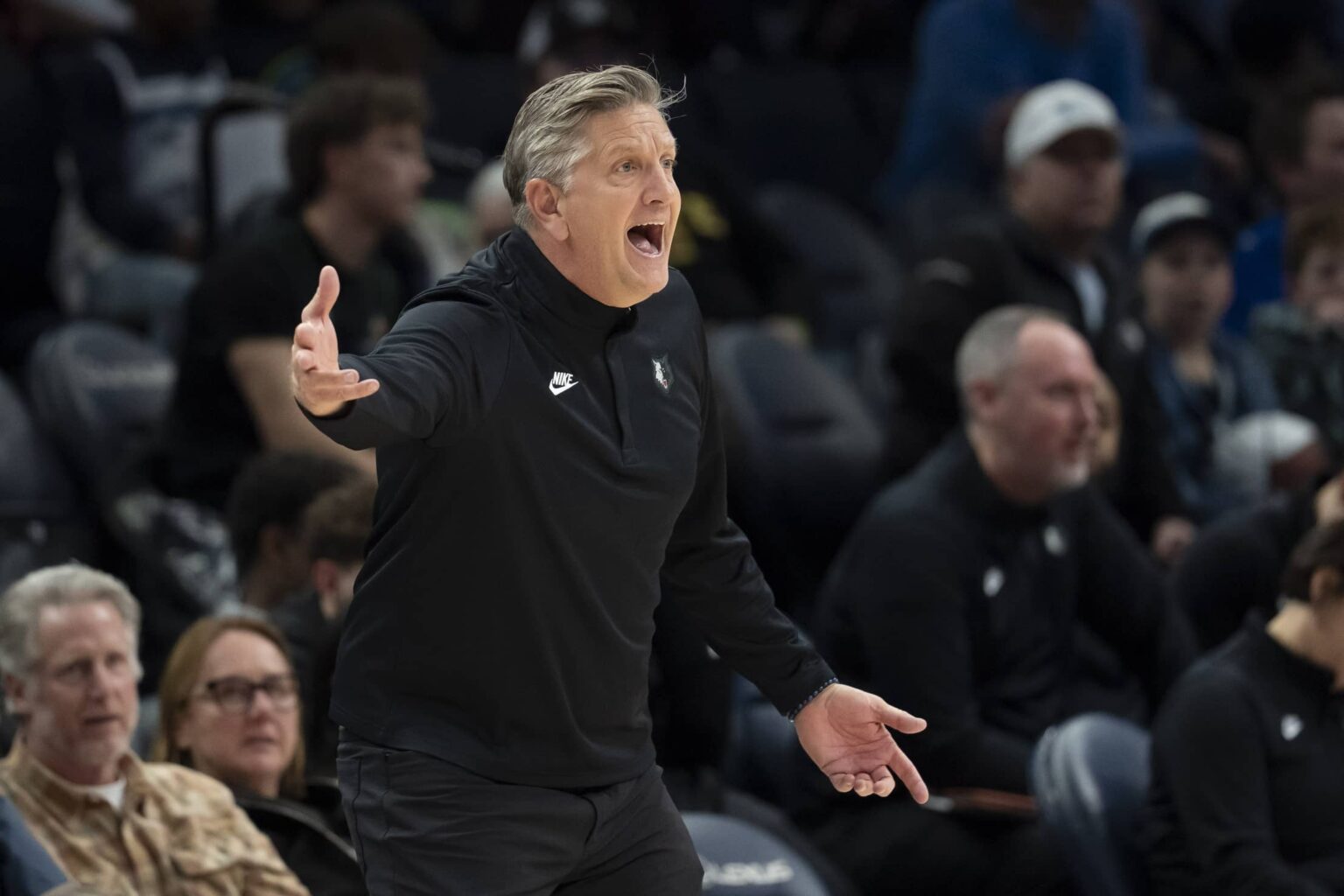Dec 17, 2025; Minneapolis, Minnesota, USA; Minnesota Timberwolves head coach Chris Finch reacts towards an official after a call against the Memphis Grizzlies in the second half at Target Center. Mandatory Credit: Jesse Johnson-Imagn Images