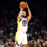 Dec 18, 2025; Phoenix, Arizona, USA; Golden State Warriors guard Stephen Curry (30) against the Phoenix Suns in the first half at Mortgage Matchup Center. Mandatory Credit: Mark J. Rebilas-Imagn Images