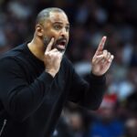 Dec 20, 2025; Denver, Colorado, USA; Houston Rockets head coach Ime Udoka yells rom the bench during the second half against the Denver Nuggets at Ball Arena. Mandatory Credit: Christopher Hanewinckel-Imagn Images