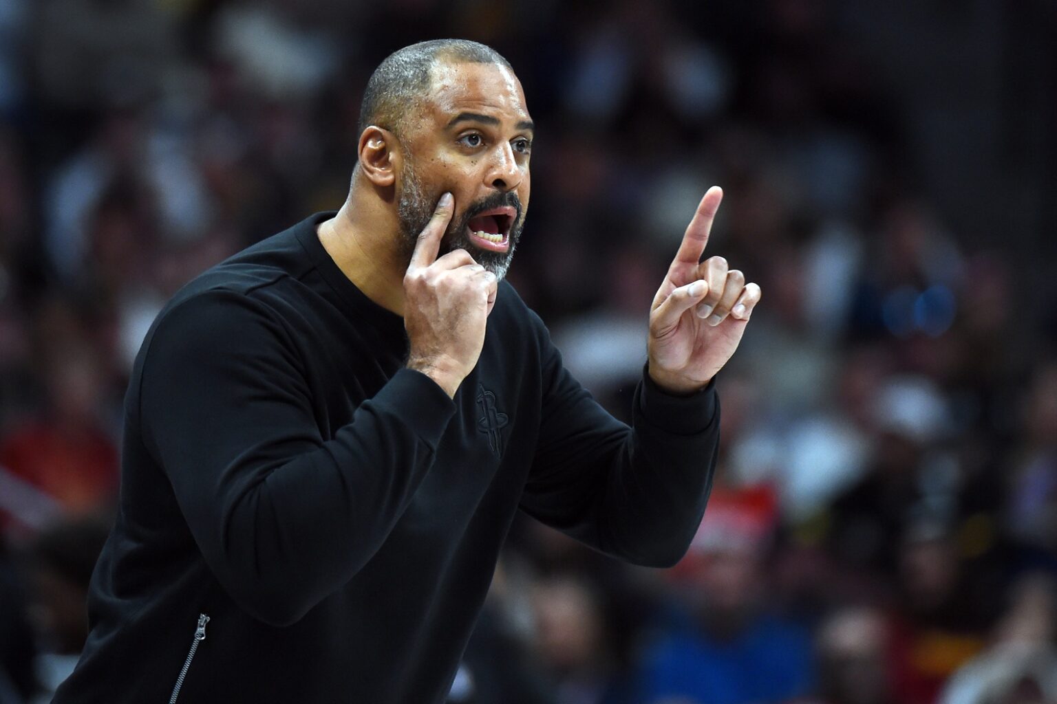 Dec 20, 2025; Denver, Colorado, USA; Houston Rockets head coach Ime Udoka yells rom the bench during the second half against the Denver Nuggets at Ball Arena. Mandatory Credit: Christopher Hanewinckel-Imagn Images