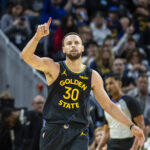 Dec 20, 2025; San Francisco, California, USA; Golden State Warriors guard Stephen Curry (30) reacts after scoring against the Phoenix Suns during the fourth quarter at Chase Center. Mandatory Credit: John Hefti-Imagn Images
