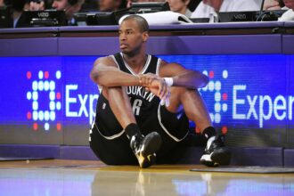 February 23, 2014; Los Angeles, CA, USA; Brooklyn Nets center Jason Collins (46) waits to enter the game against the Los Angeles Lakers during the second half at Staples Center. Mandatory Credit: Gary A. Vasquez-Imagn Images