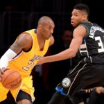 Dec 15, 2015; Los Angeles, CA, USA; Milwaukee Bucks forward Giannis Antetokounmpo (34) defends Los Angeles Lakers forward Kobe Bryant (24) as he drives to the basket in the first quarter of the game at Staples Center. Mandatory Credit: Jayne Kamin-Oncea-USA TODAY Sports