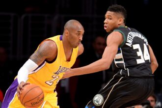 Dec 15, 2015; Los Angeles, CA, USA; Milwaukee Bucks forward Giannis Antetokounmpo (34) defends Los Angeles Lakers forward Kobe Bryant (24) as he drives to the basket in the first quarter of the game at Staples Center. Mandatory Credit: Jayne Kamin-Oncea-USA TODAY Sports