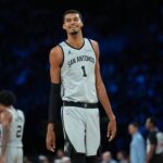 Dec 13, 2025; Las Vegas, Nevada, USA; San Antonio Spurs forward Victor Wembanyama (1) stands on the court against the Oklahoma City Thunder during the second quarter at T-Mobile Arena. Mandatory Credit: Kirby Lee-Imagn Images