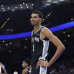 Dec 25, 2025; Oklahoma City, Oklahoma, USA; San Antonio Spurs forward Victor Wembanyama (1) smiles after a play against the Oklahoma City Thunder during the second half at Paycom Center. Mandatory Credit: Alonzo Adams-Imagn Images