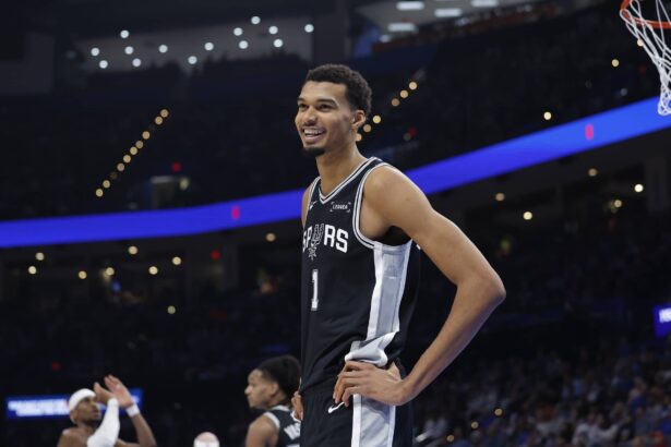Dec 25, 2025; Oklahoma City, Oklahoma, USA; San Antonio Spurs forward Victor Wembanyama (1) smiles after a play against the Oklahoma City Thunder during the second half at Paycom Center. Mandatory Credit: Alonzo Adams-Imagn Images
