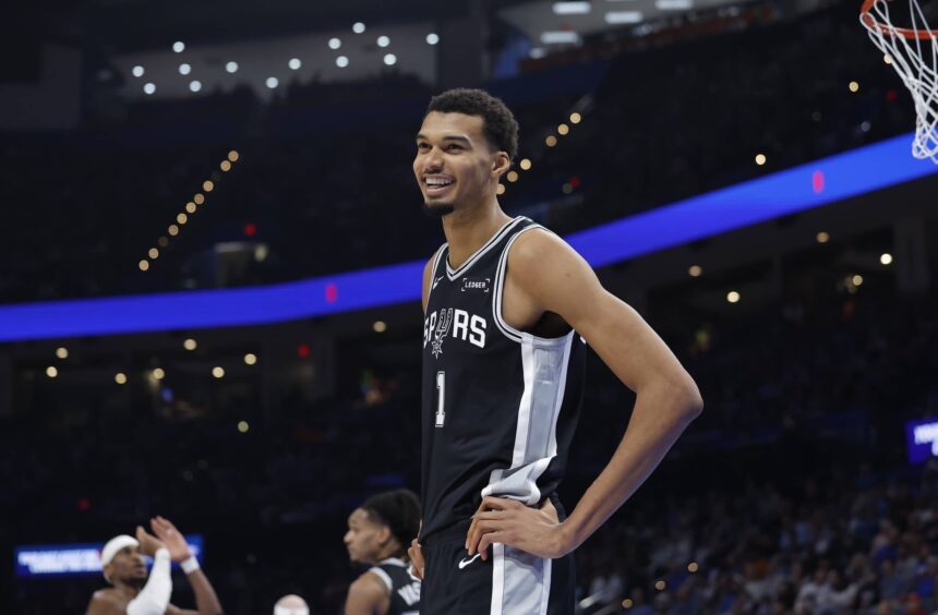 Dec 25, 2025; Oklahoma City, Oklahoma, USA; San Antonio Spurs forward Victor Wembanyama (1) smiles after a play against the Oklahoma City Thunder during the second half at Paycom Center. Mandatory Credit: Alonzo Adams-Imagn Images
