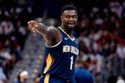 Oct 24, 2025; New Orleans, Louisiana, USA; New Orleans Pelicans forward Zion Williamson (1) reacts to a play against the San Antonio Spurs during the second half at Smoothie King Center. Mandatory Credit: Stephen Lew-Imagn Images