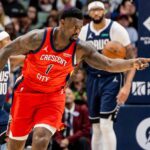 Dec 22, 2025; New Orleans, Louisiana, USA; New Orleans Pelicans forward Zion Williamson (1) reacts to a play against the Dallas Mavericks during the first half at Smoothie King Center. Mandatory Credit: Stephen Lew-Imagn Images