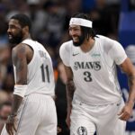 Dallas, Texas, USA; Dallas Mavericks forward Anthony Davis (3) and guard Kyrie Irving (11) celebrates after Davis dunks the ball during the game between the Dallas Mavericks and the Houston Rockets at the American Airlines Center. Mandatory Credit: Jerome Miron-Imagn Images