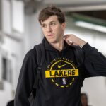 New Orleans, Louisiana, USA; Los Angeles Lakers guard Austin Reaves (15) arrives at the arena before the game against the New Orleans Pelicans at Smoothie King Center. Mandatory Credit: Stephen Lew-Imagn Images
