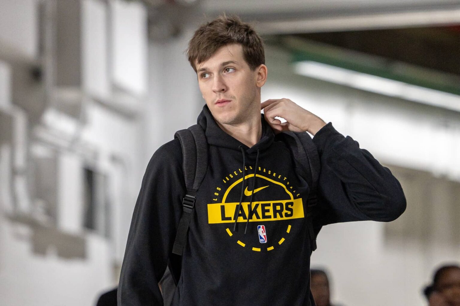 New Orleans, Louisiana, USA; Los Angeles Lakers guard Austin Reaves (15) arrives at the arena before the game against the New Orleans Pelicans at Smoothie King Center. Mandatory Credit: Stephen Lew-Imagn Images