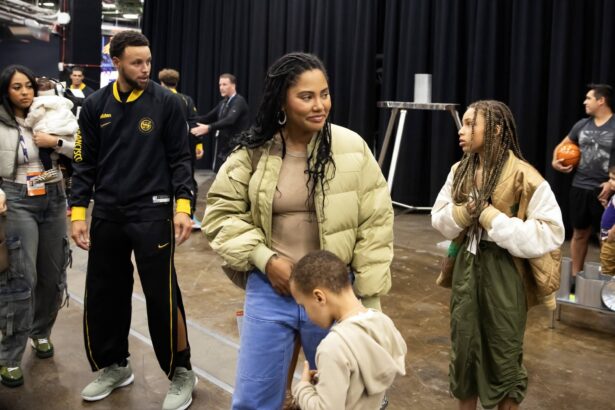 Phoenix, Arizona, USA; Golden State Warriors guard Stephen Curry (30) with wife Ayesha Curry prior to the game against the Phoenix Suns at Footprint Center. Mandatory Credit: Mark J. Rebilas-USA TODAY Sports