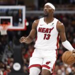 Chicago, Illinois, USA; Miami Heat center Bam Adebayo (13) brings the ball up court against the Chicago Bulls during the second half at United Center. Mandatory Credit: Kamil Krzaczynski-Imagn Images