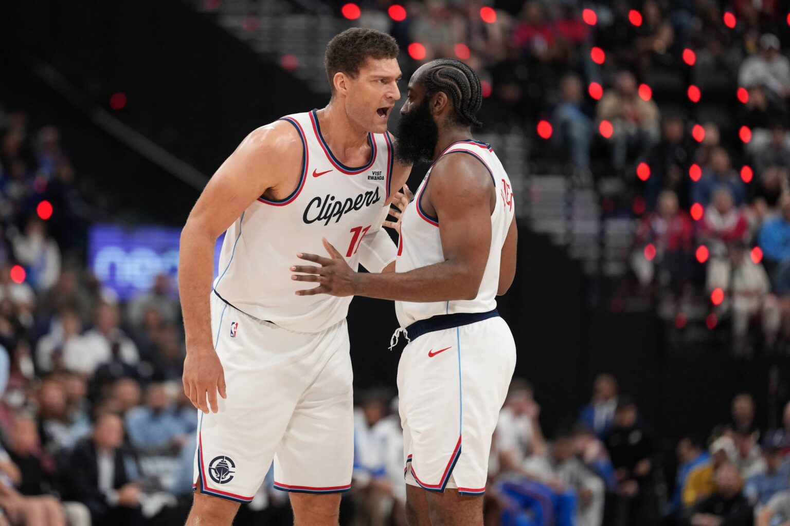 Inglewood, California, USA; LA Clippers center Brook Lopez (11) speaks to guard James Harden (1) against the Oklahoma City Thunder in the first half at Intuit Dome. Mandatory Credit: Kirby Lee-Imagn Images