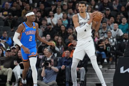 Feb 29, 2024; San Antonio, Texas, USA; San Antonio Spurs center Victor Wembanyama (1) looks down the court beside Oklahoma City Thunder guard Shai Gilgeous-Alexander (2) in the first half at Frost Bank Center. Mandatory Credit: Daniel Dunn-Imagn Images