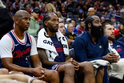 Sacramento, California, USA; Los Angeles Clippers guard Chris Paul (3) and forward Kawhi Leonard (2) and guard James Harden (1) sit on the bench during the fourth quarter against the Sacramento Kings at Golden 1 Center. Mandatory Credit: Sergio Estrada-Imagn Images