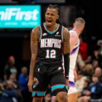 Memphis, Tennessee, USA; Memphis Grizzlies point guard Ja Morant (12) celebrates after making a three-pointer in the second half against the Utah Jazz at FedExForum. Mandatory Credit: Matthew Smith-Imagn Images