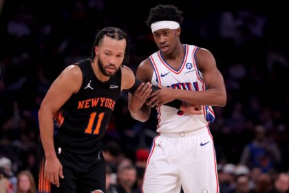 New York, New York, USA; New York Knicks guard Jalen Brunson (11) defends Philadelphia 76ers guard VJ Edgecombe (77) during the third quarter at Madison Square Garden. Mandatory Credit: Brad Penner-Imagn Images