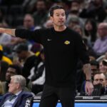 Milwaukee, Wisconsin, USA; Los Angeles Lakers head coach JJ Redick gestures during the first quarter against the Milwaukee Bucks at Fiserv Forum. Mandatory Credit: Jeff Hanisch-Imagn Images
