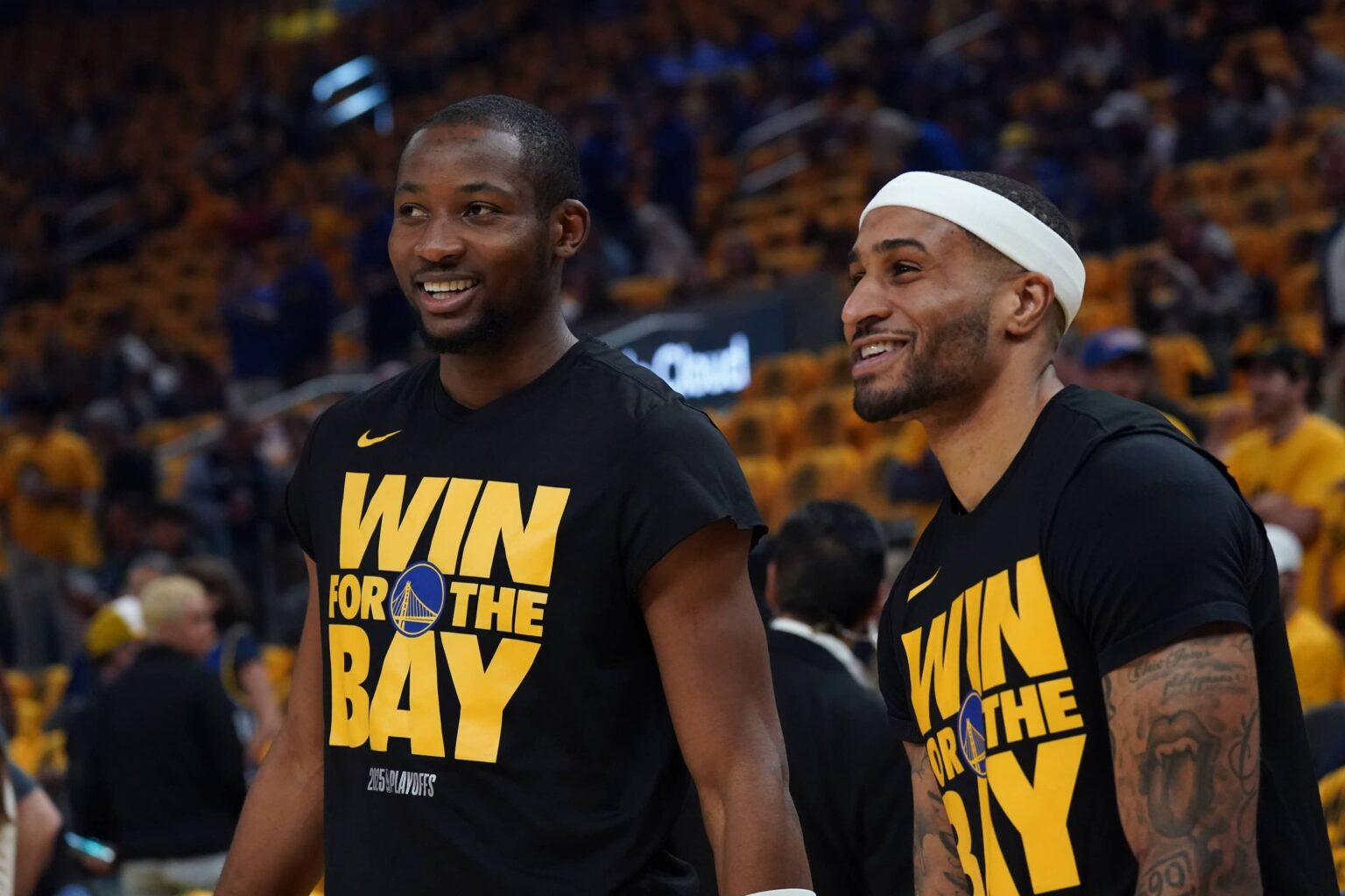 San Francisco, California, USA; Golden State Warriors forward Jonathan Kuminga (00) and guard Gary Payton II (0) warm up before Game 3 of the second round of the 2025 NBA Playoffs against the Minnesota Timberwolves at Chase Center. Mandatory Credit: David Gonzales-Imagn Images