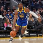 San Francisco, California, USA; Golden State Warriors forward Jonathan Kuminga (00) drives to the basket against the Memphis Grizzlies in the second quarter at Chase Center. Mandatory Credit: David Gonzales-Imagn Images