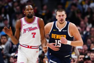 Denver, Colorado, USA; Houston Rockets forward Kevin Durant (7) and Denver Nuggets center Nikola Jokic (15) during the second quarter at Ball Arena. Mandatory Credit: Ron Chenoy-Imagn Images