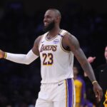 Los Angeles, California, USA; Los Angeles Lakers forward LeBron James (23) reacts in the first half against the Memphis Grizzlies at Crypto.com Arena. Mandatory Credit: Kirby Lee-Imagn Images