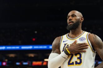 Phoenix, Arizona, USA; Los Angeles Lakers forward LeBron James (23) looks on during the second half of a game against the Phoenix Suns at Mortgage Matchup Center. Mandatory Credit: Allan Henry-Imagn Images