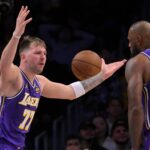 Los Angeles, California, USA; Los Angeles Lakers guard Luka Doncic (77) and forward Lebron James (23) react after a foul call during the second half against the San Antonio Spurs at Crypto.com Arena. Mandatory Credit: Jayne Kamin-Oncea-Imagn Images