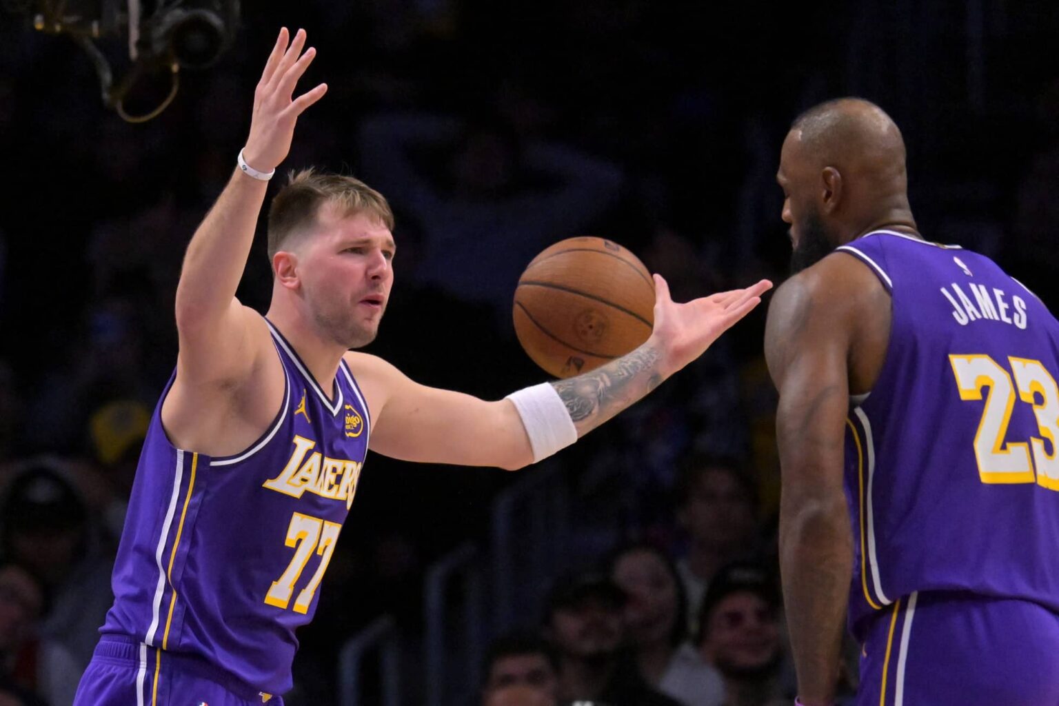Los Angeles, California, USA; Los Angeles Lakers guard Luka Doncic (77) and forward Lebron James (23) react after a foul call during the second half against the San Antonio Spurs at Crypto.com Arena. Mandatory Credit: Jayne Kamin-Oncea-Imagn Images