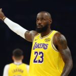 Phoenix, Arizona, USA; Los Angeles Lakers forward LeBron James (23) reacts against the Phoenix Suns at Mortgage Matchup Center. Mandatory Credit: Mark J. Rebilas-Imagn Images