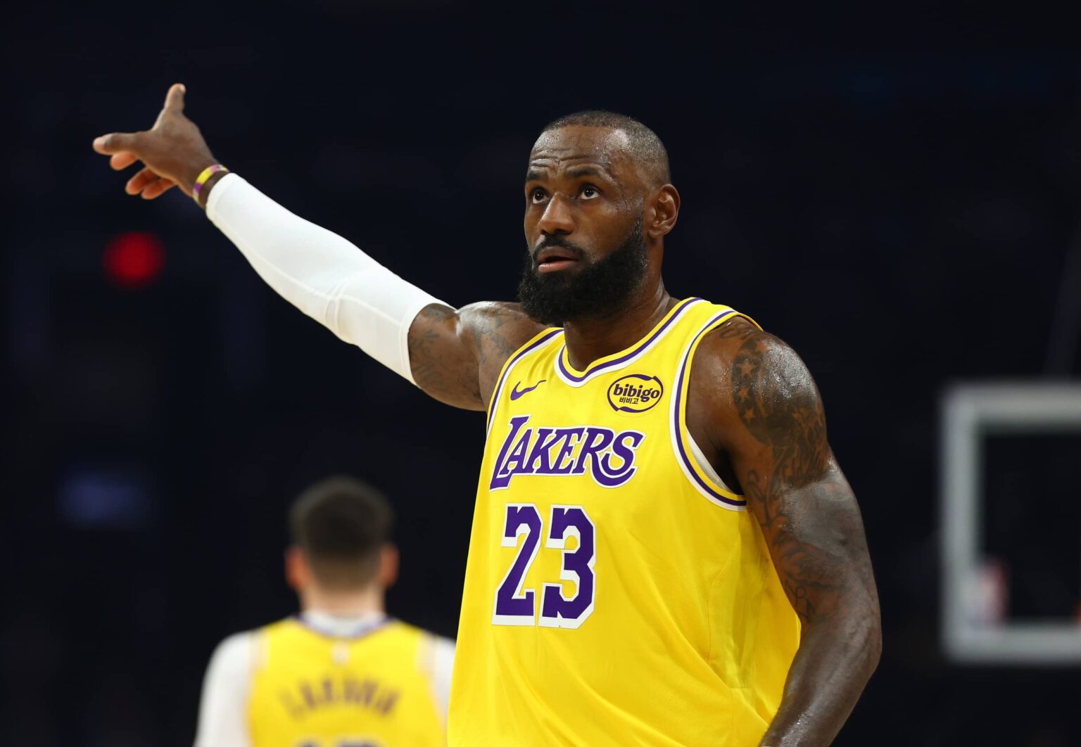 Phoenix, Arizona, USA; Los Angeles Lakers forward LeBron James (23) reacts against the Phoenix Suns at Mortgage Matchup Center. Mandatory Credit: Mark J. Rebilas-Imagn Images