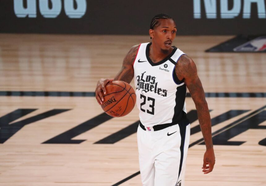 Lake Buena Vista, Florida, USA; LA Clippers guard Lou Williams (23) controls the ball against the Denver Nuggets in the first quarter of a NBA basketball game at AdventHealth Arena. Mandatory Credit: Kim Klement-Imagn Images