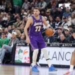 Salt Lake City, Utah, USA; Los Angeles Lakers forward/guard Luka Doncic (77) dribbles during the first quarter against the Utah Jazz at Delta Center. Mandatory Credit: Chris Nicoll-Imagn Images