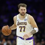 Philadelphia, Pennsylvania, USA; Los Angeles Lakers guard Luka Doncic (77) in action against the Philadelphia 76ers during the first quarter at Xfinity Mobile Arena. Mandatory Credit: Bill Streicher-Imagn Images