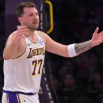 Los Angeles, California, USA; Los Angeles Lakers guard Luka Doncic (77) reacts after not getting a foul call in the first half against the Sacramento Kings at Crypto.com Arena. Mandatory Credit: Jayne Kamin-Oncea-Imagn Images
