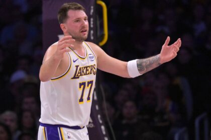 Los Angeles, California, USA; Los Angeles Lakers guard Luka Doncic (77) reacts after not getting a foul call in the first half against the Sacramento Kings at Crypto.com Arena. Mandatory Credit: Jayne Kamin-Oncea-Imagn Images