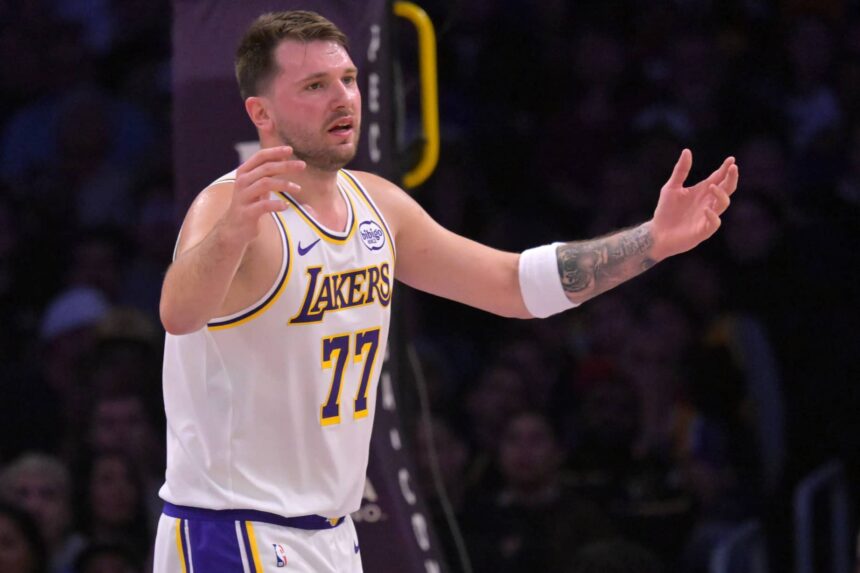 Los Angeles, California, USA; Los Angeles Lakers guard Luka Doncic (77) reacts after not getting a foul call in the first half against the Sacramento Kings at Crypto.com Arena. Mandatory Credit: Jayne Kamin-Oncea-Imagn Images