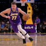 Los Angeles, California, USA; Los Angeles Lakers guard Luka Doncic (77) handles the ball during the second half against the San Antonio Spurs at Crypto.com Arena. Mandatory Credit: Jayne Kamin-Oncea-Imagn Images