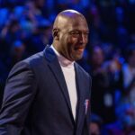 Cleveland, Ohio, USA; NBA great Michael Jordan is honored for being selected to the NBA 75th Anniversary Team during halftime in the 2022 NBA All-Star Game at Rocket Mortgage FieldHouse. Mandatory Credit: Kyle Terada-Imagn Images