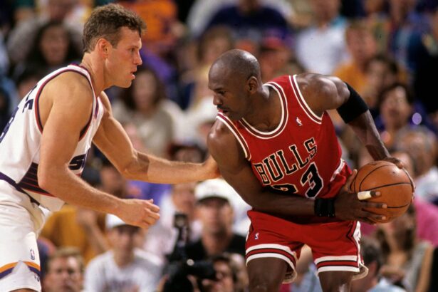 Suns guard Dan Majerle defends Bulls guard Michael Jordan during Game 1 of the NBA Finals in 1993 in Phoenix.