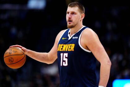 Denver, Colorado, USA; Denver Nuggets center Nikola Jokic (15) controls the ball in the fourth quarter against the Houston Rockets at Ball Arena. Mandatory Credit: Ron Chenoy-Imagn Images