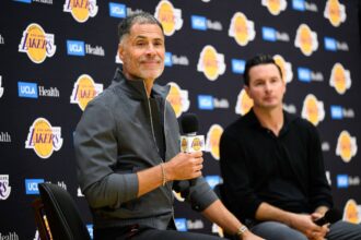 El Segundo, CA, USA; Los Angeles Lakers general manager Rob Pelinka, left, speaks during a press conference to preview the 2025-26 season at UCLA Health Training Center. Mandatory Credit: William Liang-Imagn Images