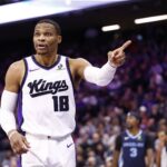 Sacramento, California, USA; Sacramento Kings guard Russell Westbrook (18) gestures after a play against the Memphis Grizzlies during the fourth quarter at Golden 1 Center. Mandatory Credit: Kelley L Cox-Imagn Images