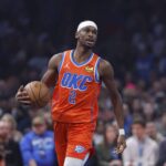 Oklahoma City, Oklahoma, USA; Oklahoma City Thunder guard Shai Gilgeous-Alexander (2) dribbles down the court against the Minnesota Timberwolves during the first quarter at Paycom Center. Mandatory Credit: Alonzo Adams-Imagn Images