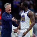 Sacramento, California, USA; Golden State Warriors forward Draymond Green (23) talks with head coach Steve Kerr during the fourth quarter against the Sacramento Kings at Golden 1 Center. Mandatory Credit: Sergio Estrada-Imagn Images