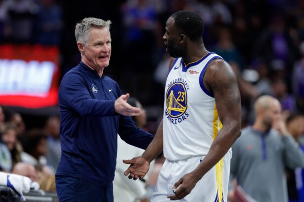 Sacramento, California, USA; Golden State Warriors forward Draymond Green (23) talks with head coach Steve Kerr during the fourth quarter against the Sacramento Kings at Golden 1 Center. Mandatory Credit: Sergio Estrada-Imagn Images